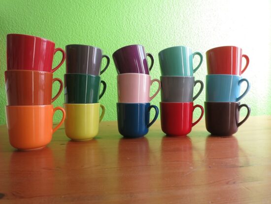 Multi-coloured rows of stacked cups representing diversity