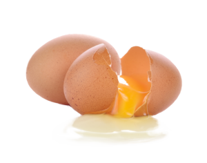 Two speckled eggs, one broken